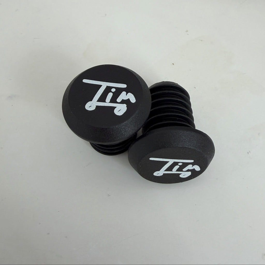 Bouchons de poignées Tim signature